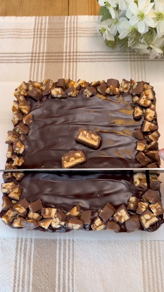 Snickers-Inspired Cheesecake Bars