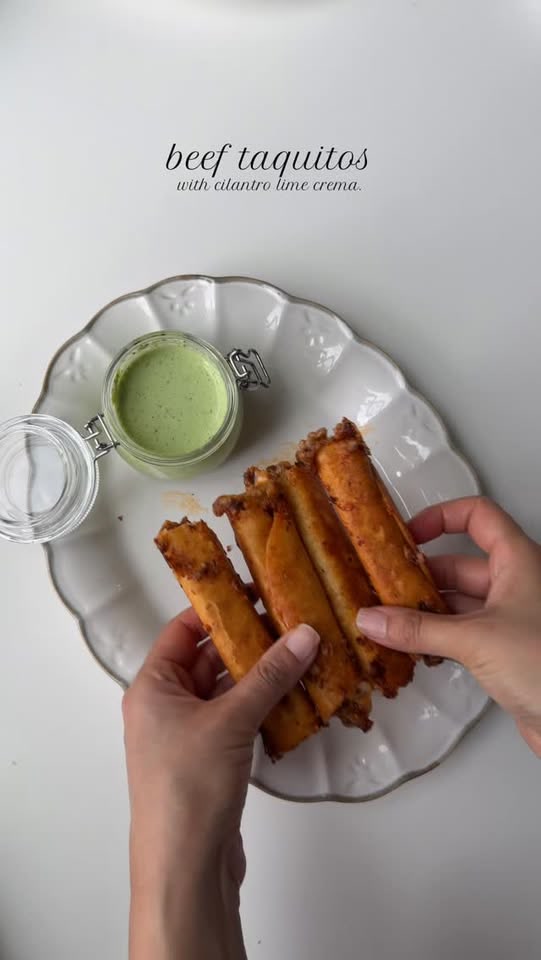 Cheesy beef taquitos with cilantro lime crema