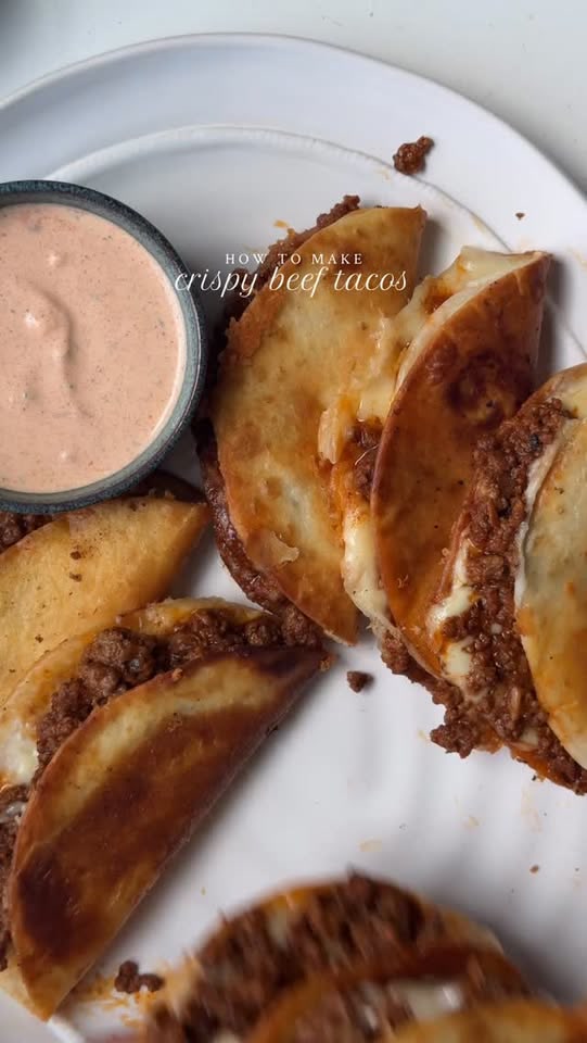 Crispy beef tacos with pico de gallo and cream taco sauce