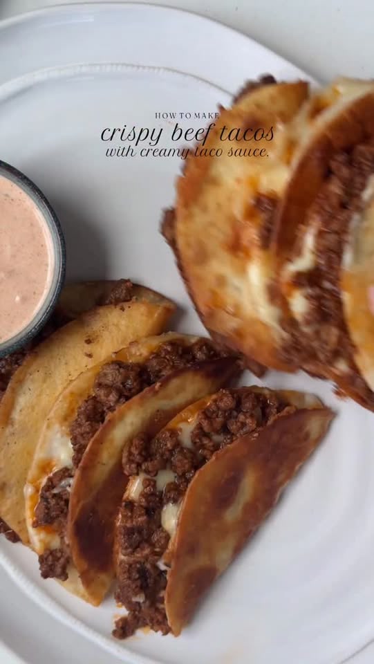 Crispy beef tacos with pico de gallo and cream taco sauce