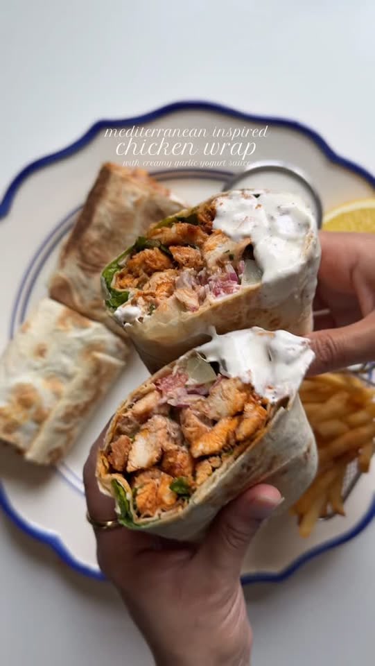 Mediterranean-inspired chicken wrap with cream garlic yogurt sauce